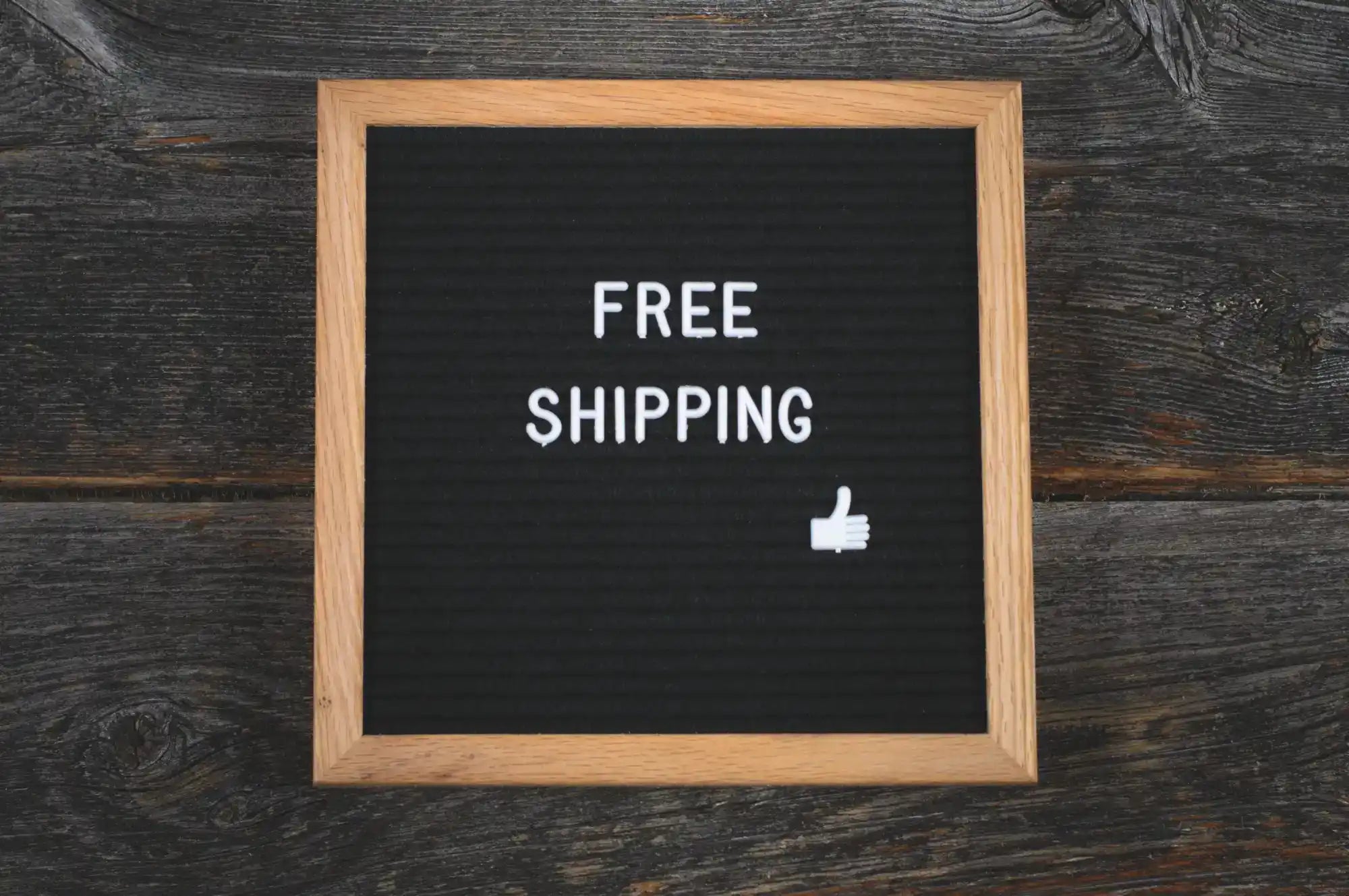 Wooden-framed sign.