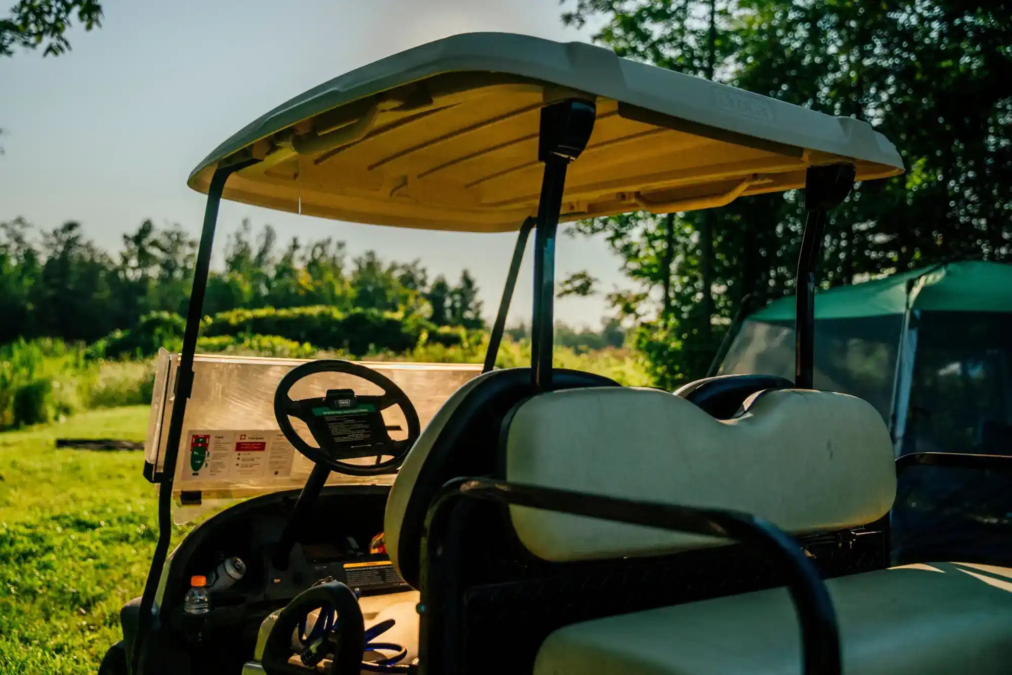 Tan golf cart.